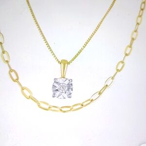 Gold and Silver Necklace Set with Dazzling Pendant and Chain Link Design.